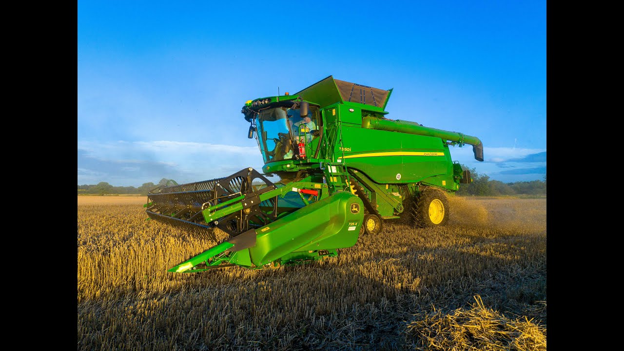 John Deere T560i cutting spring Wheat 4Kᵁᴴᴰ
