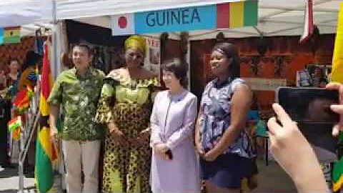 Ambassador Wife Presenting gift to H W Fumiko Hayashi, Mayor of Yokohama City, (Guinea Stand)