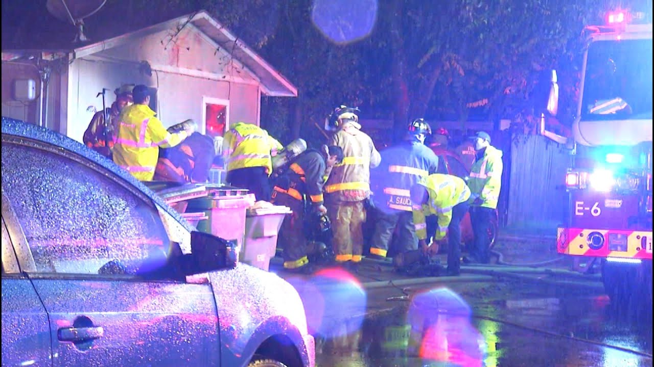 Woman hospitalized after house fire on North Side, SAFD says - YouTube