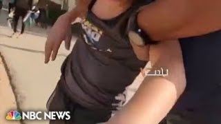 Video shows Hamas militants kidnapping 12-year-old boy