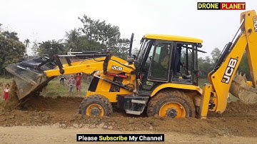 JCB Backhoe Cutting Mud & Leveling Farming Field