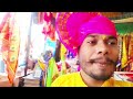 Baba ke nishan ki pooja karte huye