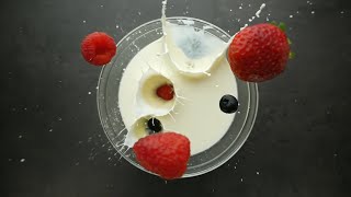 Royalty Free Video | Mesmerizing Slow-Motion: Berry Splash in Milk
