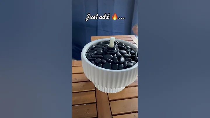 How to make a tabletop fire bowl with a planter, tiki torch and some rocks. #homedecor #diy #walmart