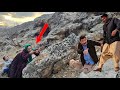 A moment of worry: Jamila and the operator struggle to survive in the darkness of the mountains.