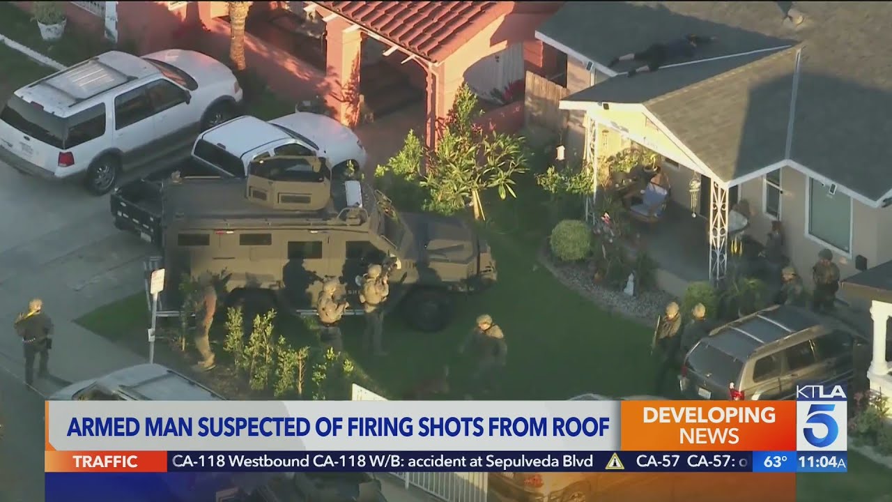 Man in custody after allegedly firing shots from Walnut Park rooftop ...