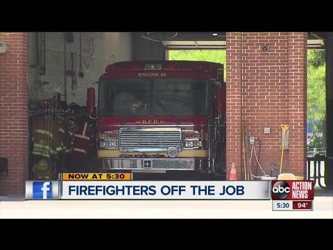 Fire truck ride puts two firefighters in hot water