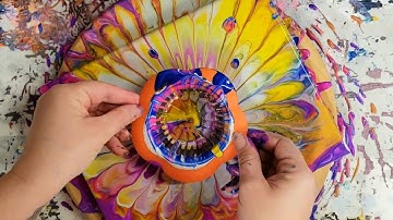 Fluid art spin art! Acrylic pour through a sink strainer on a lazy susan