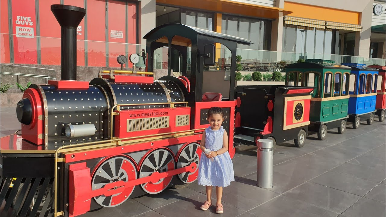 Kiara explores on a train journey at Festival City YouTube