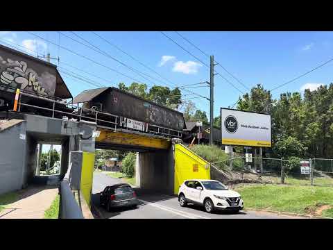 Aurzion’s 2308D and 2389 crossing over the Oxley Road bridge in Corinda on a Empty Coal heading west
