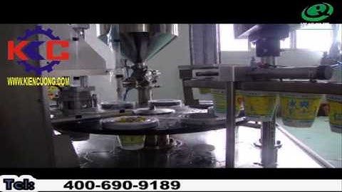 Máy chiết - dán miệng cốc dạng mâm xoay 1 đầu tự động - KienCuong.com