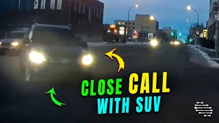 Driver Narrowly Avoiding Crash with an SUV