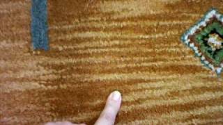 Is your rug Hand Knotted or Hand Tufted?