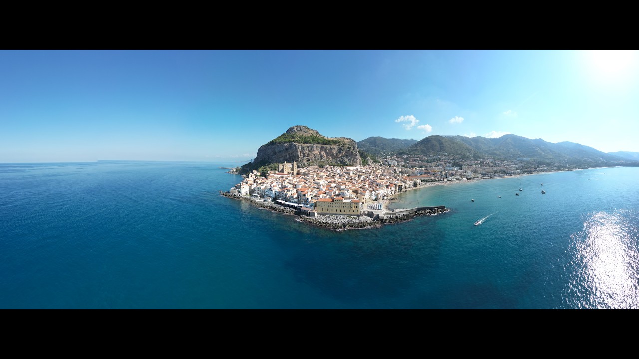 Cefalù, un giorno, una notte tra pietra vento e mare.