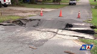 Weekend downpour leaves sinkhole and flood damage across Mount Airy