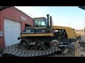 Caterpillar Challenger 75c track removal.