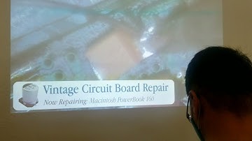 Live circuit board repair at VCF West 2021 on a Macintosh PowerBook 160