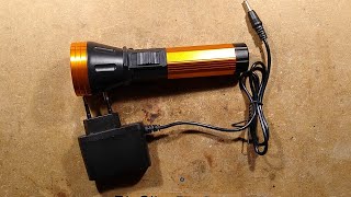 Rechargeable torch with dangerous charger  (with schematics)