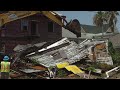 City demolishes derelict house