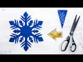 Make a magical snowflake in minutes! 🩵 A4 paper + scissors = Christmas beauty #Crafts