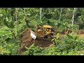 Suddenly full powered cat d6r xl bulldozer leveling cliff mountain access road