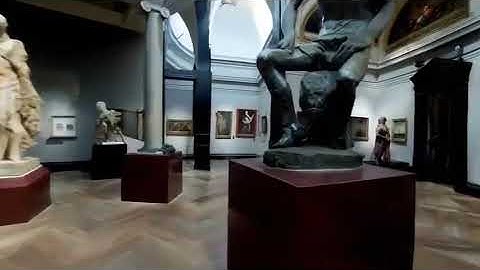 fly through tour of a museum with many paintings and sculptures and beautiful works of art in all...