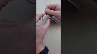 How to open / unscrew the Metal Clasp for your Retreev Tag.