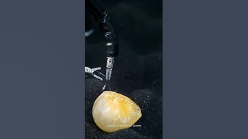 Carefully peeling a quail egg and suturing it back together.#science #robot #future