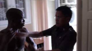 Thai Police Double Slap 419 romance scammer