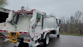 13 yd Econovo packer with Perkins cart tipper