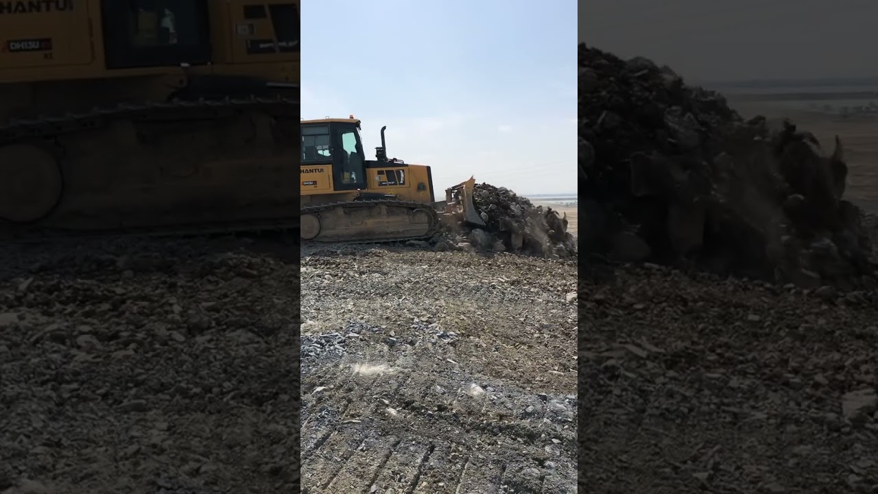 Amazing Shantui bulldozer pushing rock for slope