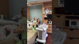 First Meeting Between Older Sibling and New Baby Sister