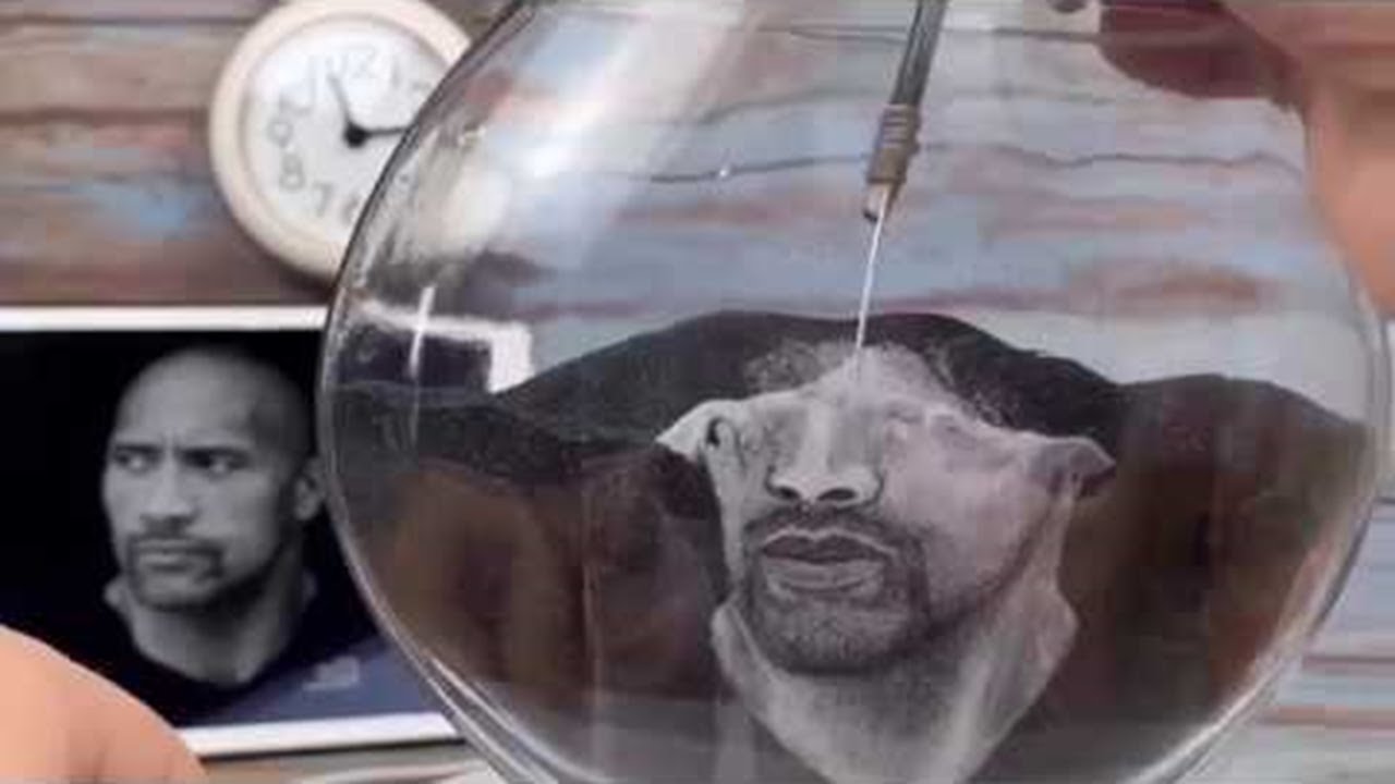 Artist Turns Sand into Rock || ViralHog - YouTube