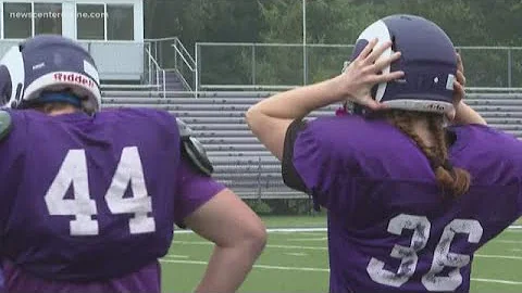 Female football player ready to help the Deering R...