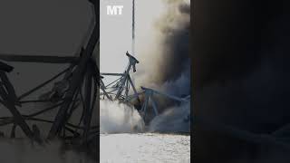 Navy salvage teams blow up a portion of the Francis Scott Key Bridge in controlled demolition