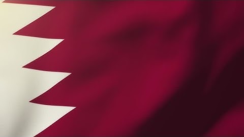 4K Qatar flag waving in the wind. Looping sun rises style. Animation loop Stock video