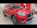 The latest 2023 mg zs 13l suv fwd  a new look version  red color  exterior and interior