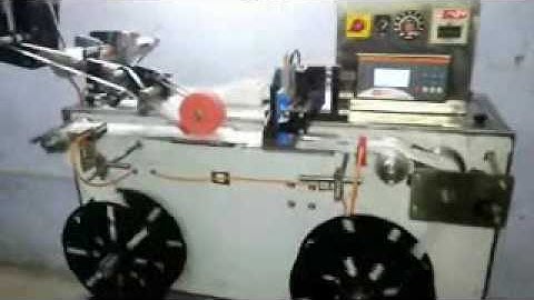 HOLOGRAM LABEL APPLICATOR WITH RE WINDER  MACHINE