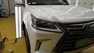 Ремонт вмятины без покраски от удара ногой на крыле LEXUS-LX-450d