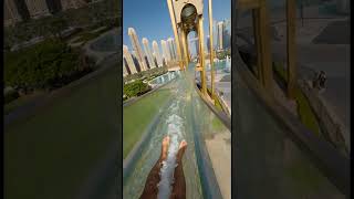 Would you dare to ride this insane Dubai Frame slide? #glassslide #waterslide #waterfall #pov #viral