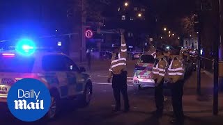 Police outside London Central Mosque after man was stabbed nearby