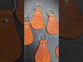 Daschund howling at the moon keychains. saddle tan. Southerncharmholsters.com