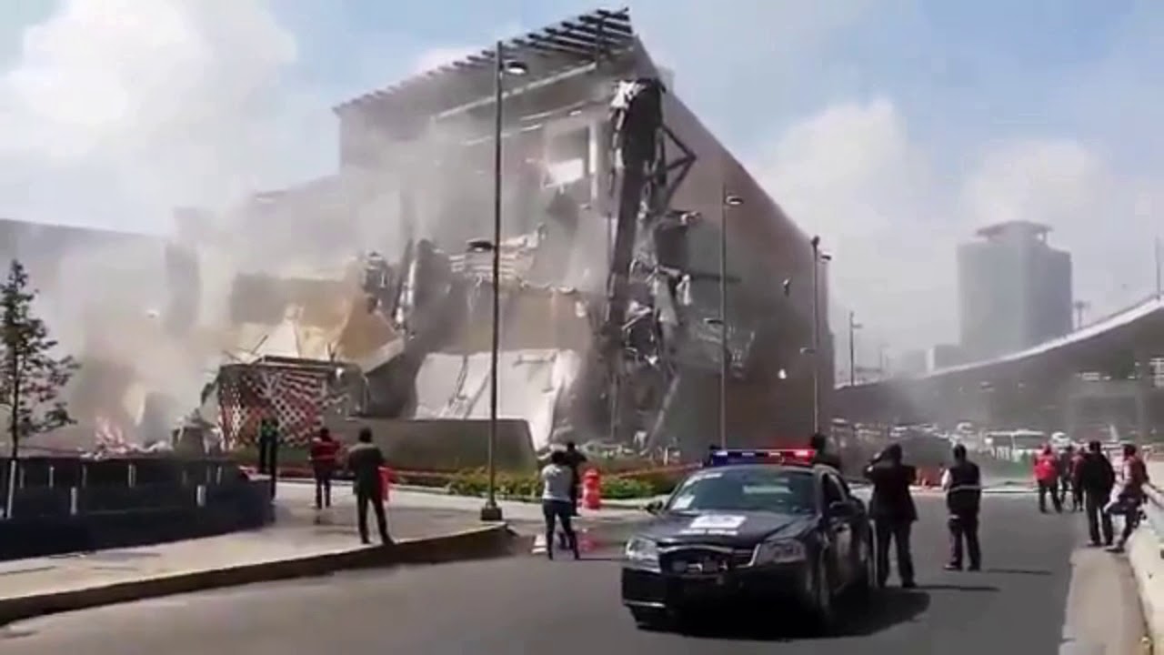 Bystanders Gather Around Collapsed Shopping Mall in Mexico City