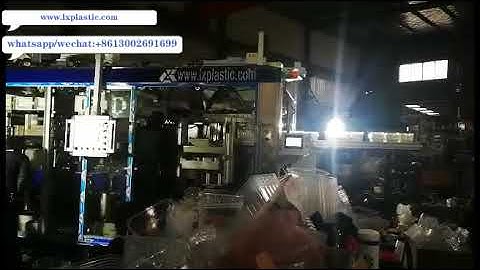 1 2  A B robot stacker for 9up pp container mould  on 3in1 thermoforming machine 201905171543