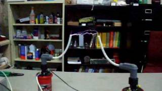 Two high power car ignition coils driven at frequency to produce a 4"
arc, different angle