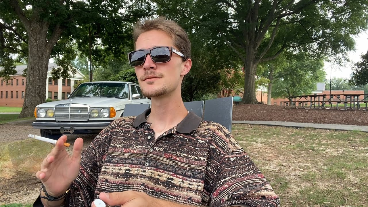 Smoking a Cigarette in an American Public Park at 5pm on a Tuesday