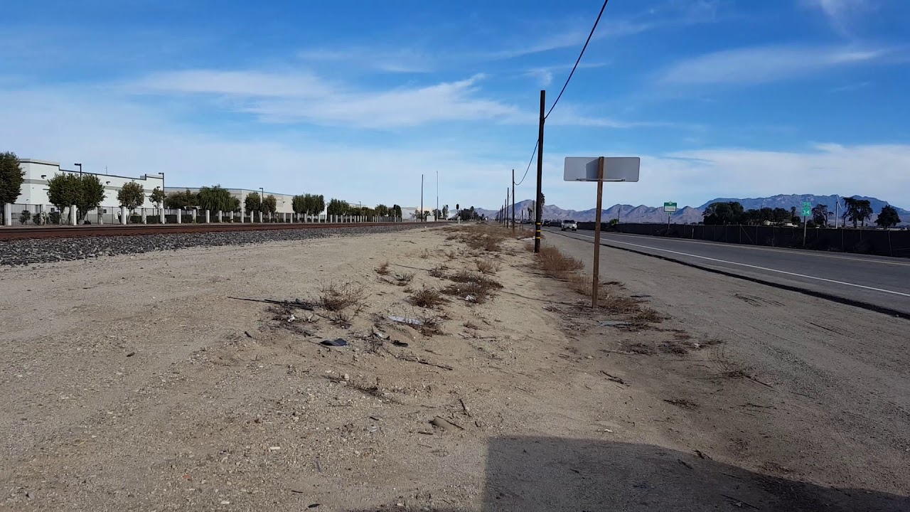 Amtrak 769 with cdtx coaches and cdtx 2052 b32-8w trailing in Oxnard
