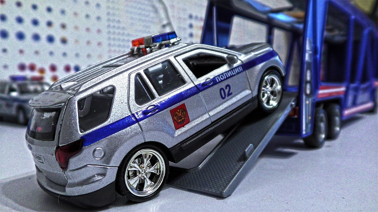 Police Cars Transported by Toy Truck from one location to another YouTube