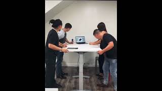 Adjustable meeting table