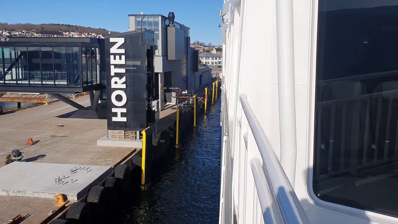 Worlds largest electric ferry connecting to a automatic robotic charger